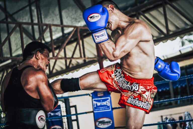 Man Kicking Thai Pads To recover From Break Up