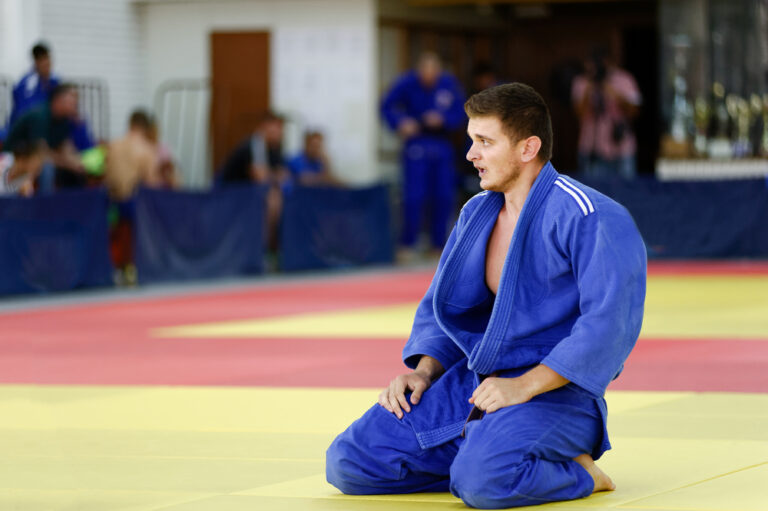 Man Exhausted from being Aggressive in Brazilian jiu-jitsu